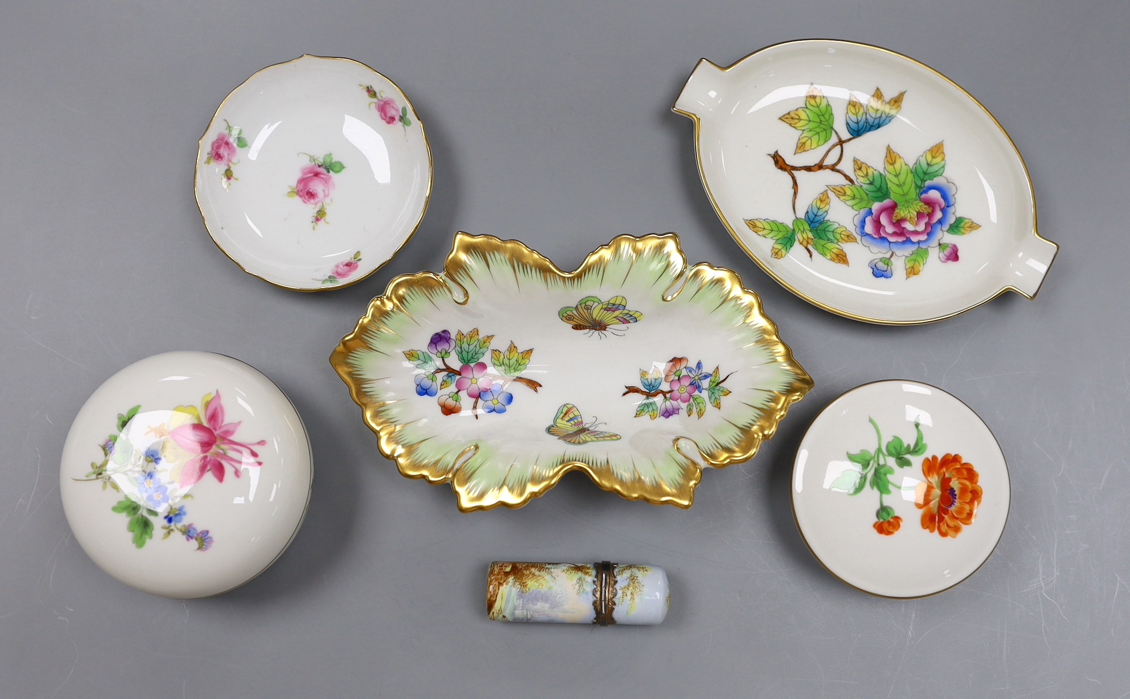 Two Meissen boxes with covers and a dish, two Herend dishes and an enamel on copper scent bottle